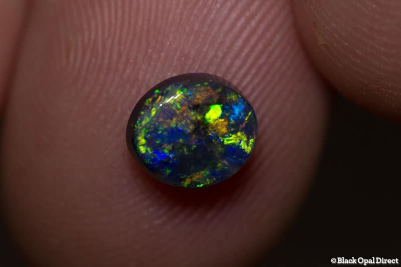 1.28 ct gem black opal 7x6x4mm - Image 2
