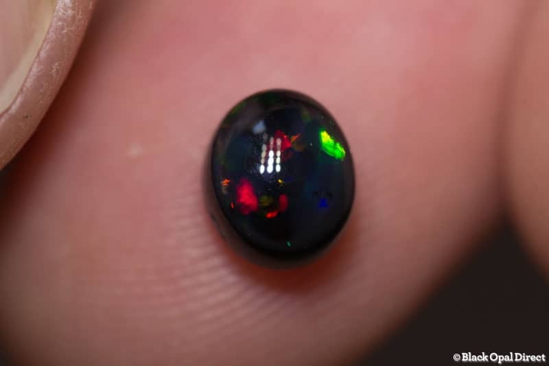 1.29 ct black opal 7x6x4.8mm - Image 2