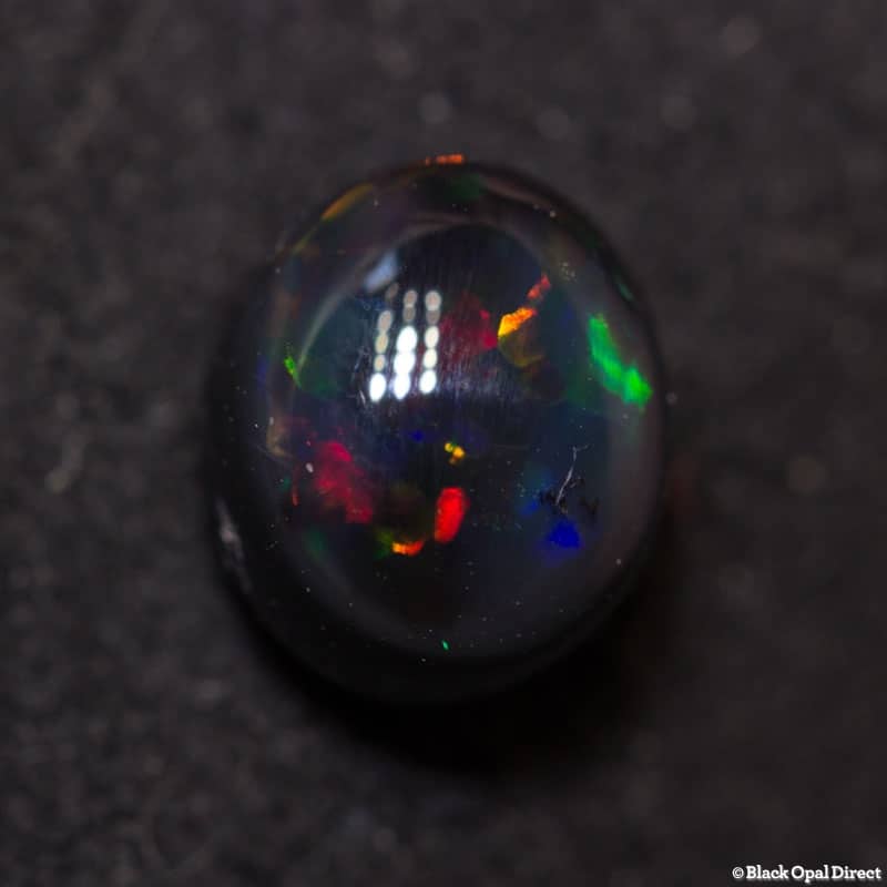 1.29 ct black opal 7x6x4.8mm - Image 4