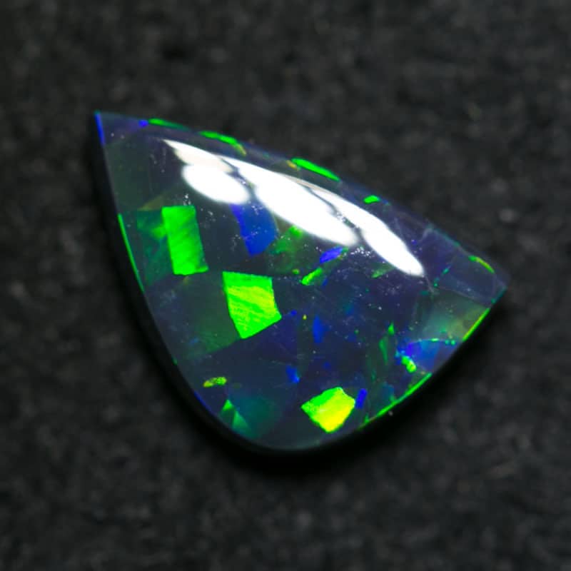 1.30 ct black opal 10x6x3mm - Image 2