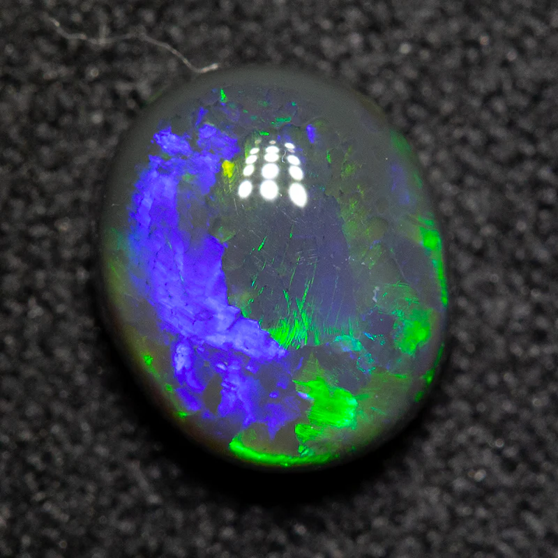 1.30 ct black opal 7.5x6.5x4mm - Image 3