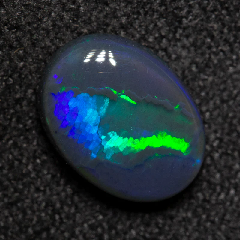 1.30 ct black opal 8.9x6.7x3.3mm - Image 2