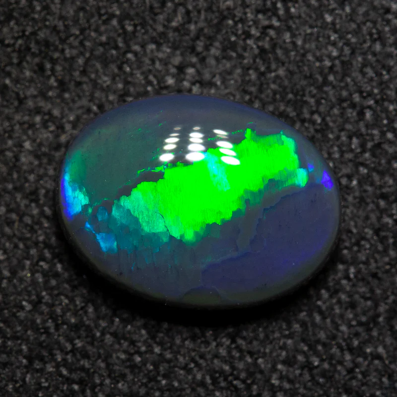 1.30 ct black opal 8.9x6.7x3.3mm - Image 3