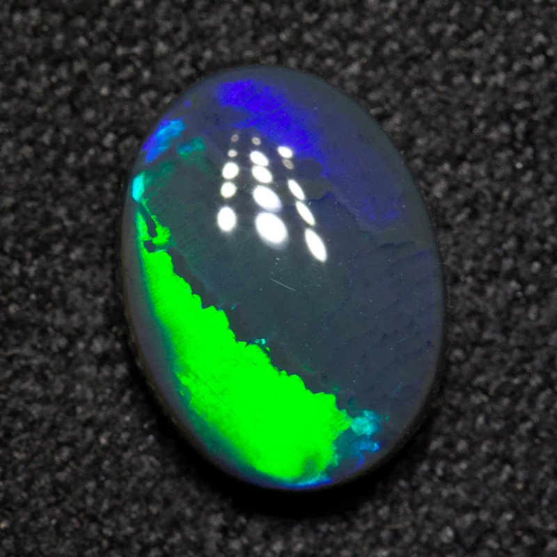 1.30 ct black opal 8.9x6.7x3.3mm - Image 4