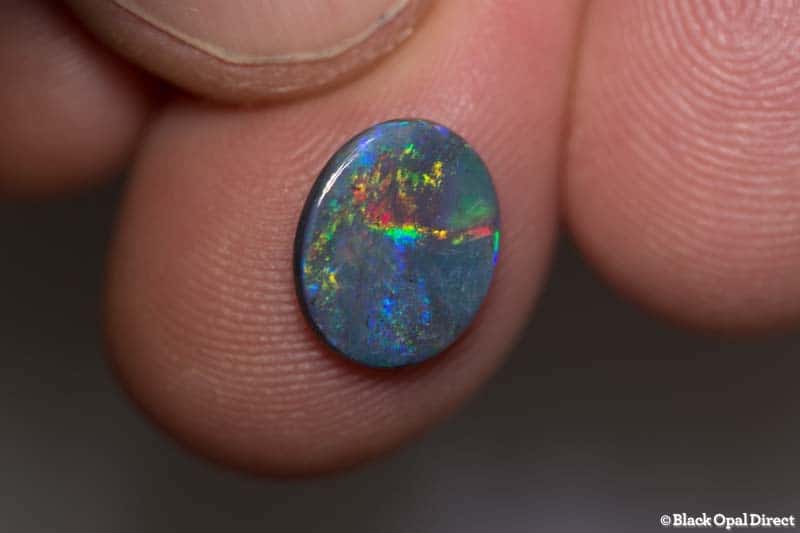 1.31 ct black opal 11x9x2mm - Image 2