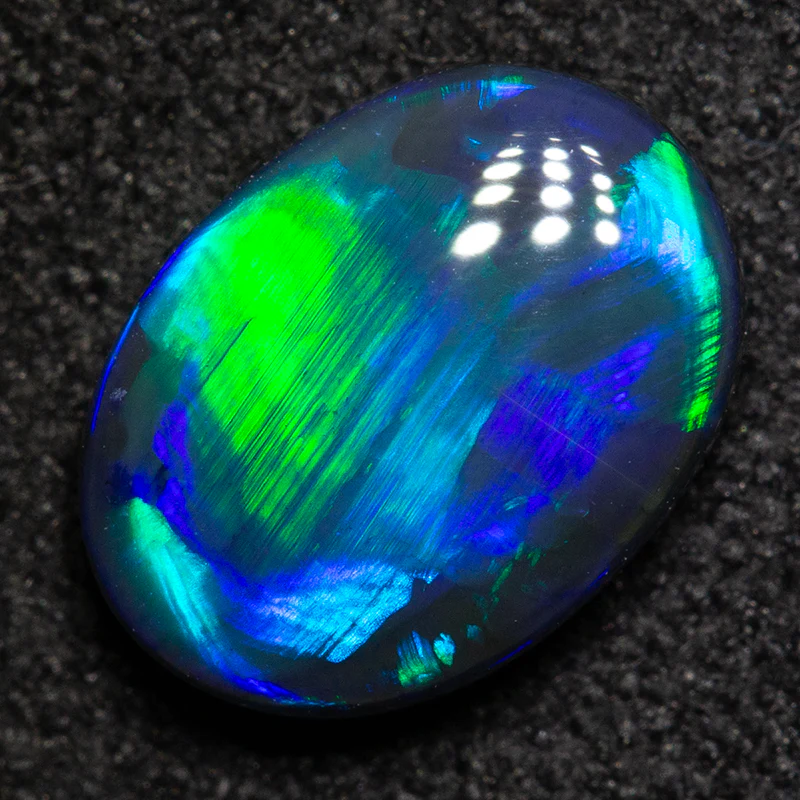 1.31 ct black opal 9x6.7x3.4mm - Image 2