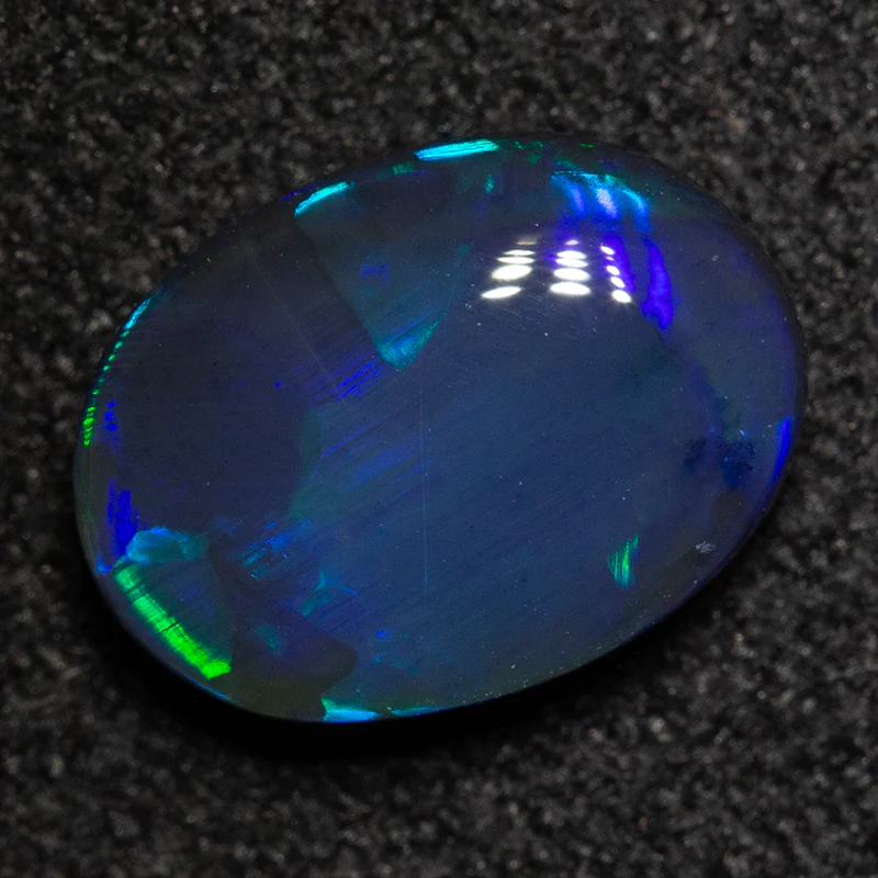 1.31 ct black opal 9x6.7x3.4mm - Image 3
