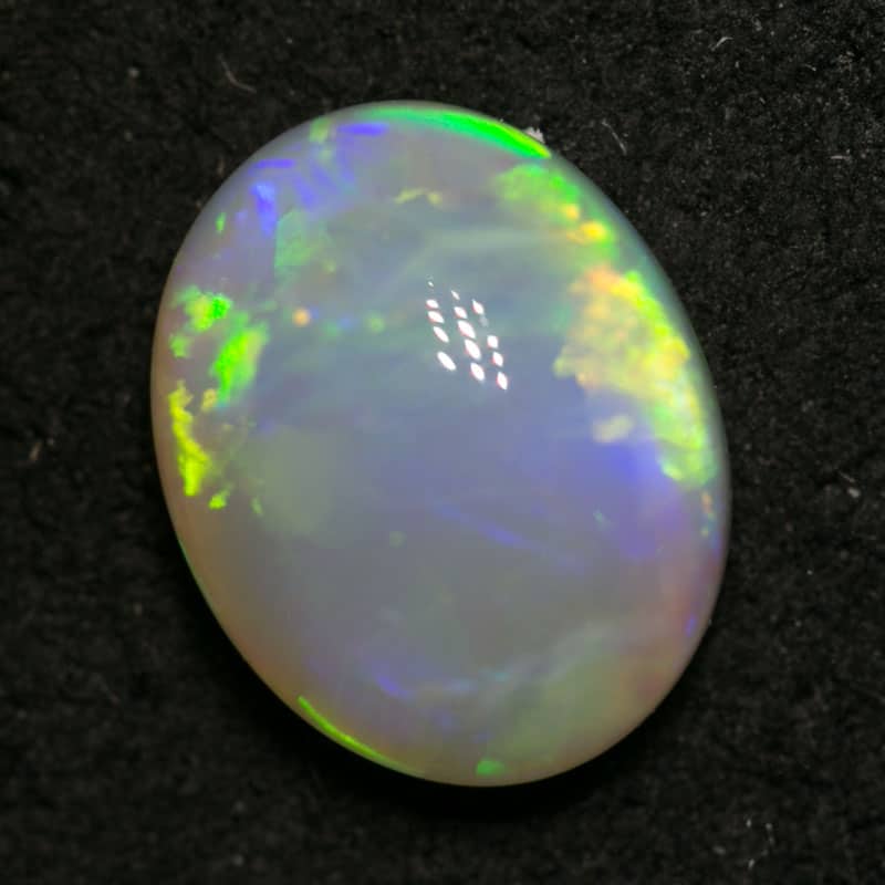 1.31 ct white opal 8x6.5x3mm - Image 2