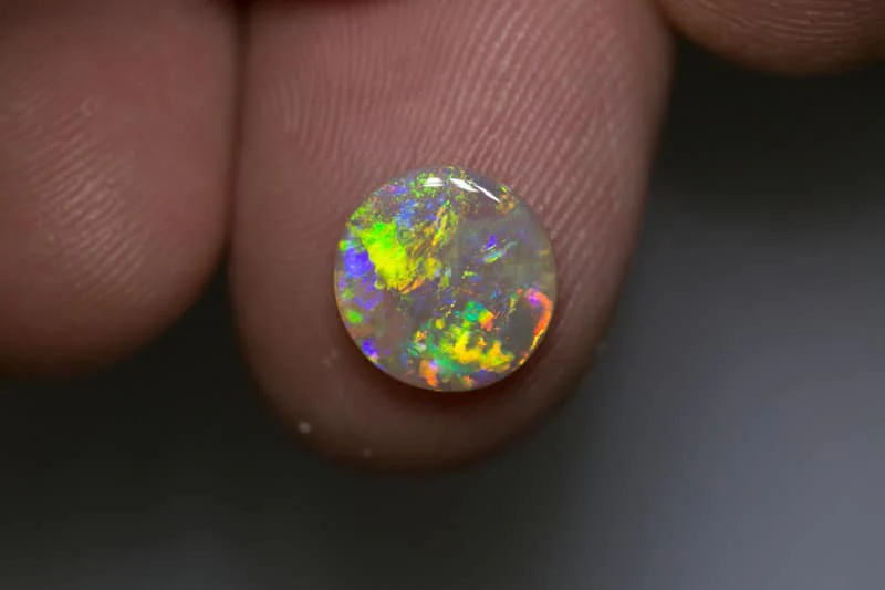 1.32 ct crystal opal round shape 9mmx2mm thick - Image 2