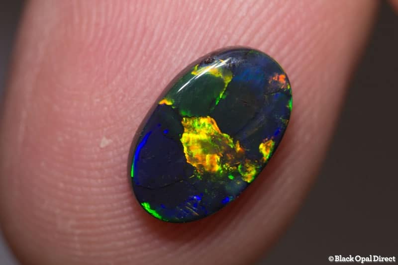 1.33 ct black opal 10.8x7.2x2mm - Image 2