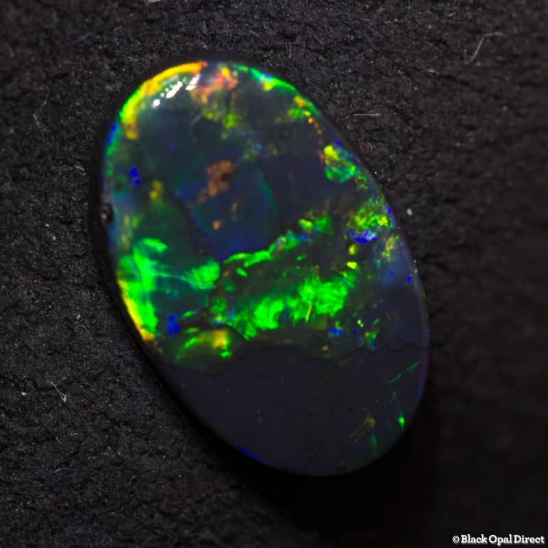 1.33 ct black opal 10.8x7.2x2mm - Image 4