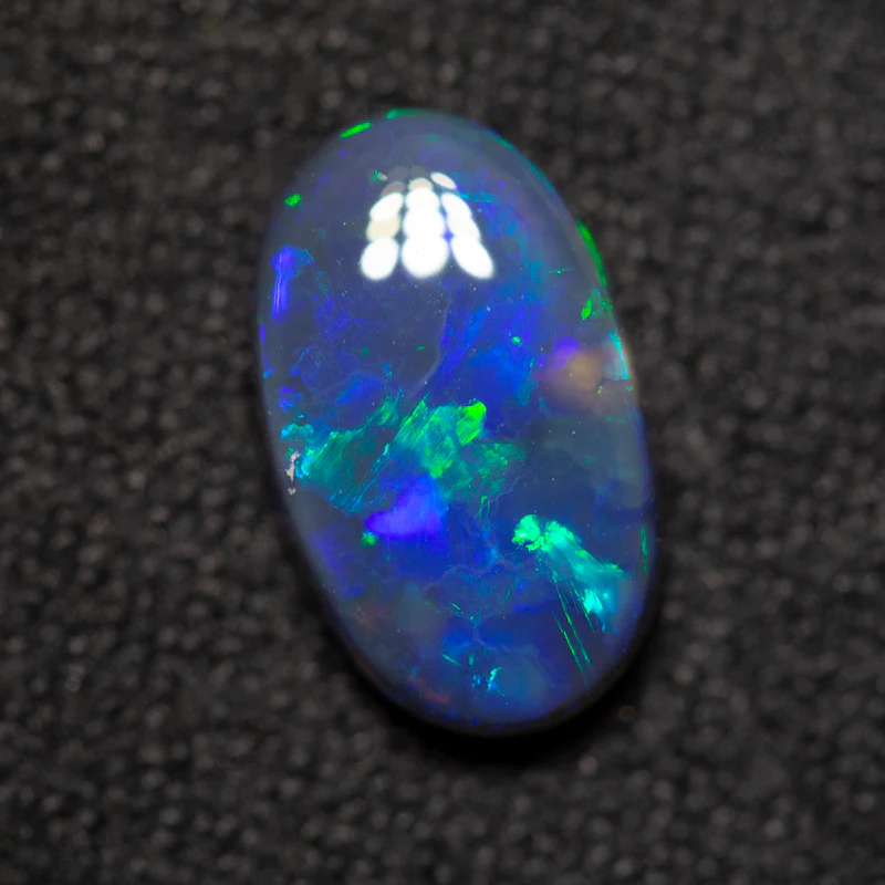 1.33 ct black opal 10x6x3.2mm - Image 2