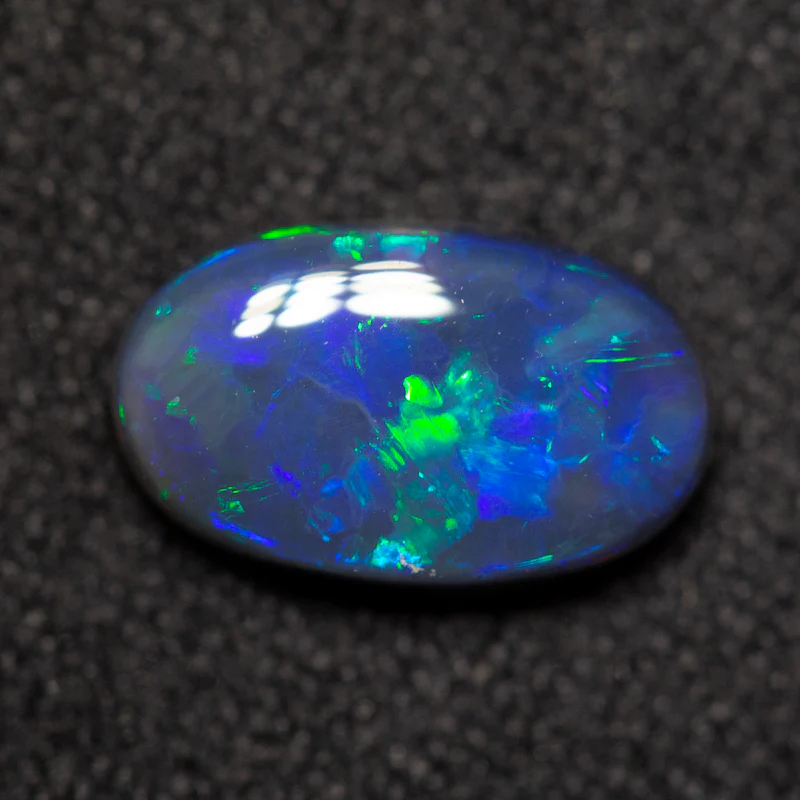 1.33 ct black opal 10x6x3.2mm - Image 3