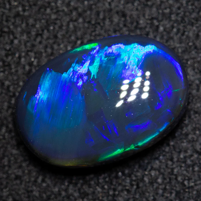 1.33 ct black opal 9x6x3mm - Image 2