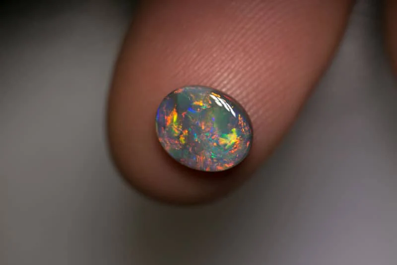 1.33 ct gem dark opal 9x7.5x3mm - Image 2