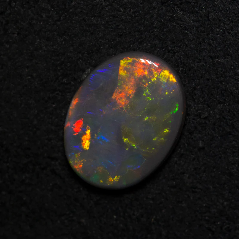 1.34 ct black opal 10.4x8x2.4mm - Image 2