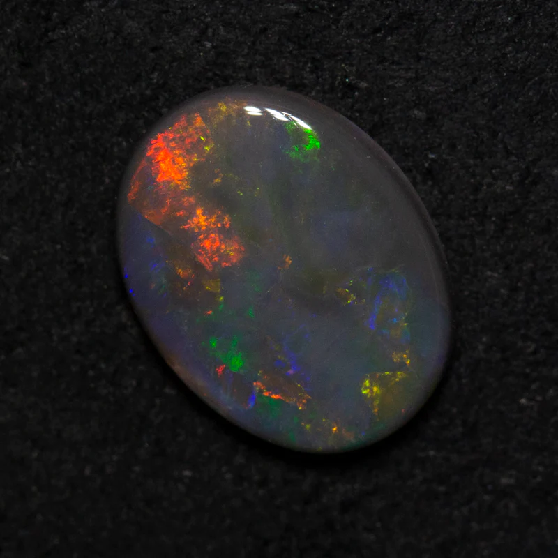 1.34 ct black opal 10.4x8x2.4mm - Image 3