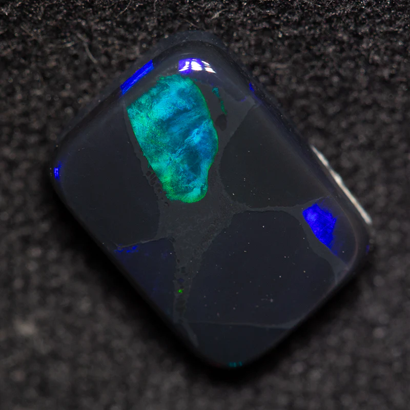 1.34 ct black opal 8.6x6.4x2.8mm - Image 2