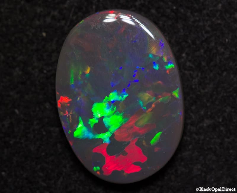1.35 ct black opal 11x8x2mm - Image 2