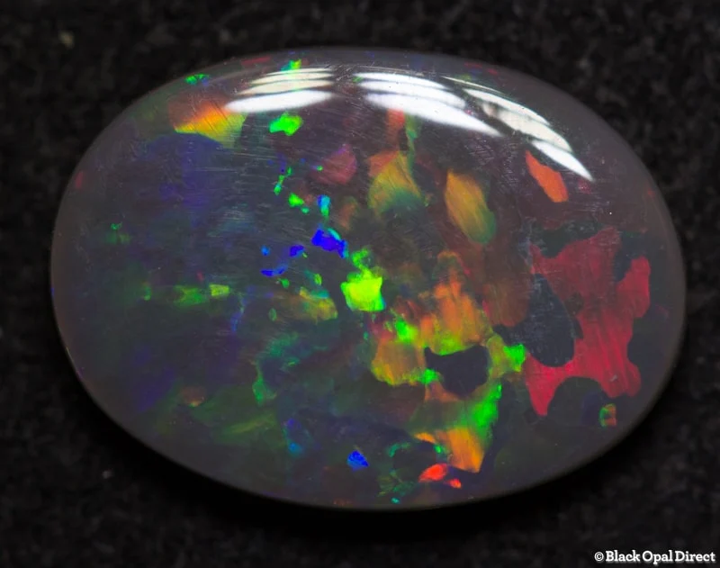 1.35 ct black opal 11x8x2mm - Image 3