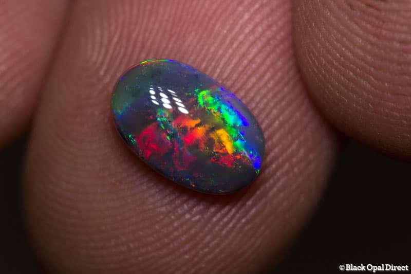 1.35 ct black opal gem 10x6x3mm - Image 3