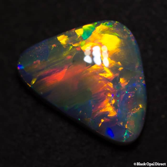 1.35 ct gem baroque black opal 10x7.5x2.5mm - Image 4