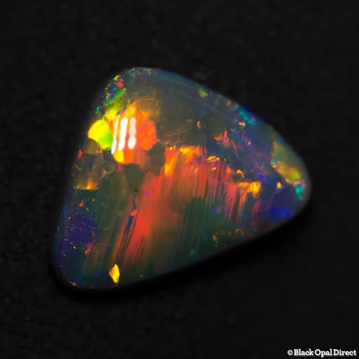 1.35 ct gem baroque black opal 10x7.5x2.5mm - Image 5