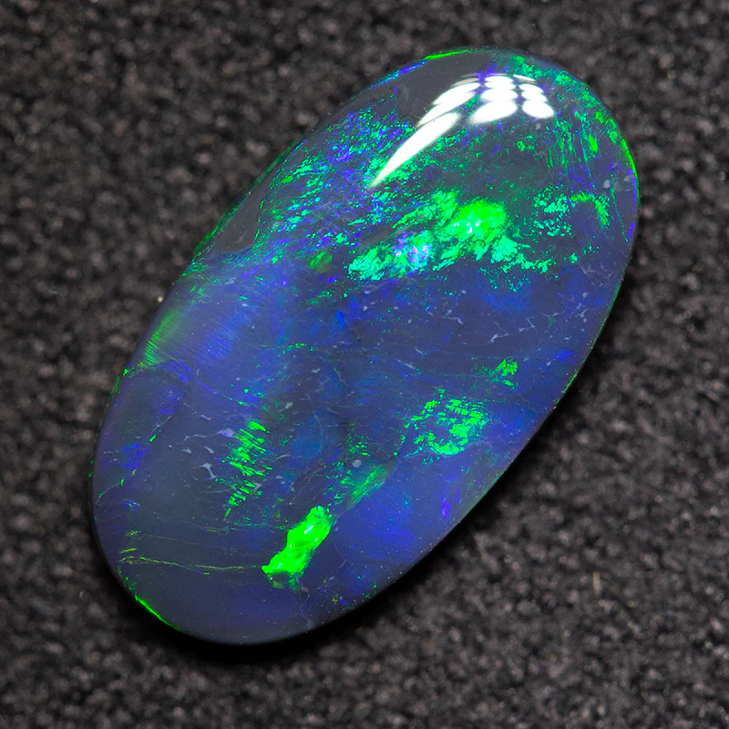 1.36 ct black opal 11.8x6.6x2.4mm - Image 2