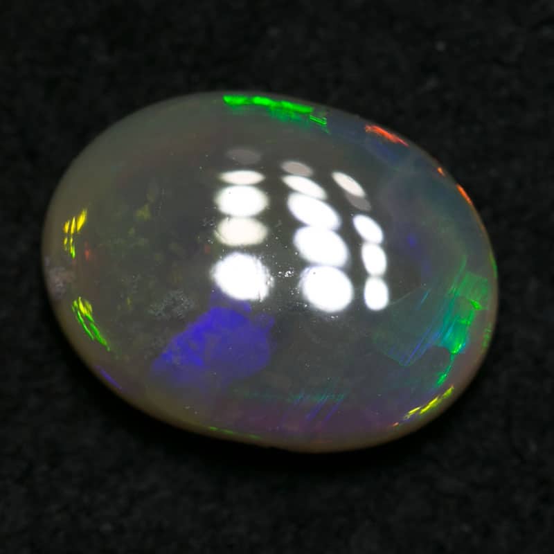 1.37 ct dark crystal opal 9x7x3mm - Image 2