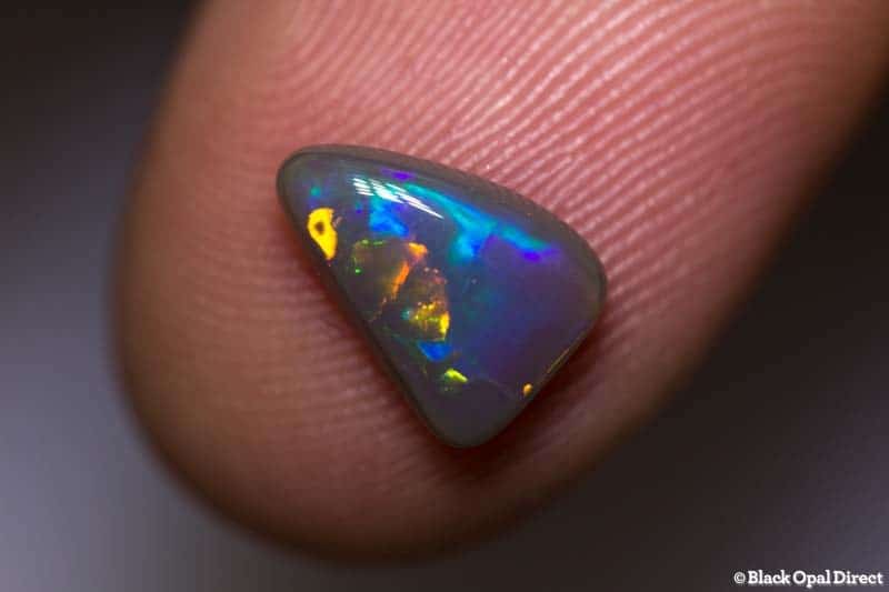 1.38 ct baroque semi black opal 10x7x3mm - Image 2