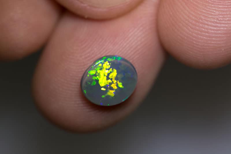 1.38 ct dark opal 9x8x3mm - Image 2