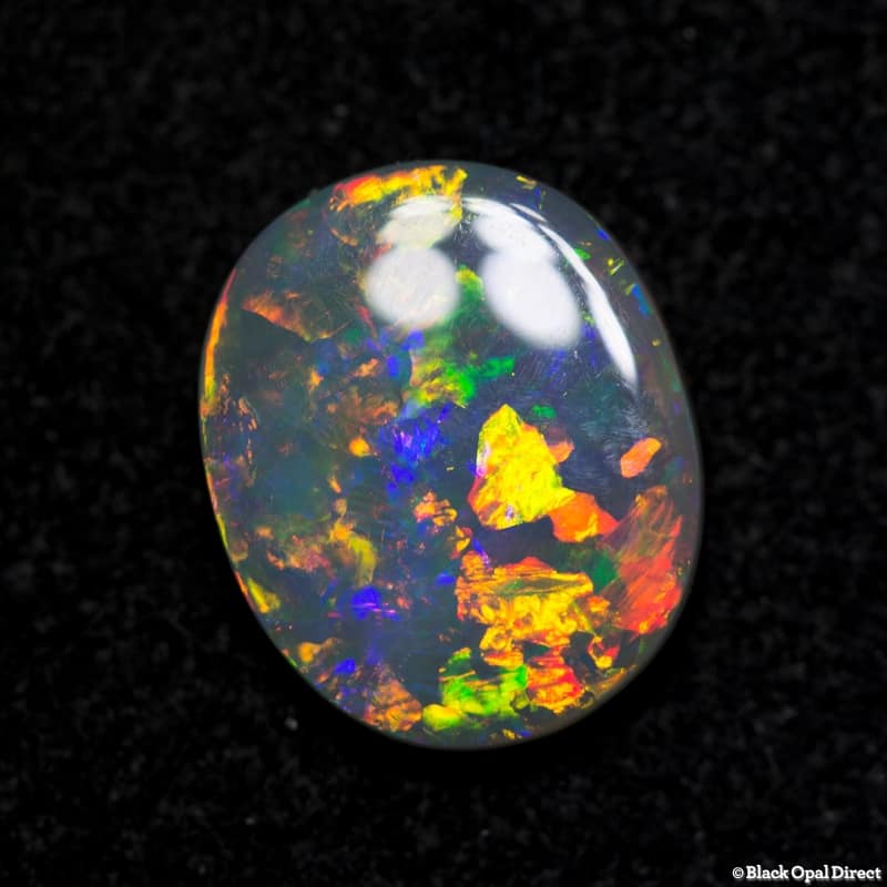 1.38 ct orange green crystal opal 10x8x2mm - Image 3