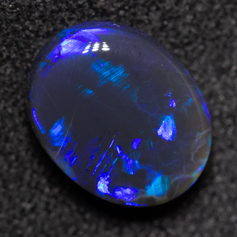 1.40 ct black opal 8.7x7x3.7mm - Image 2