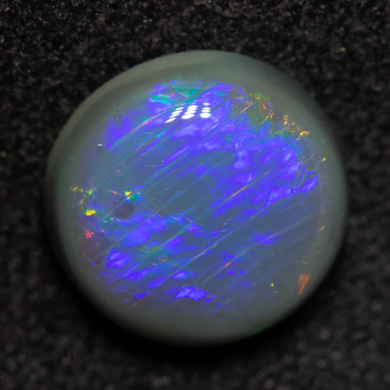 1.40 ct black opal 8x7.8x3.3mm - Image 2