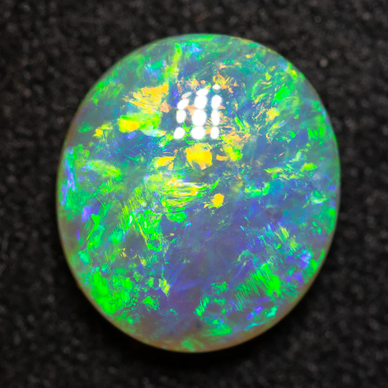 1.40 ct crystal opal 8.7x7.9x3.4mm - Image 3