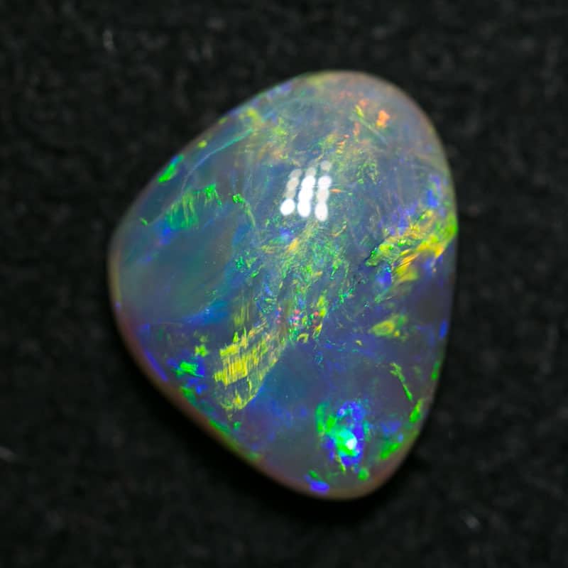 1.41 ct Baroque dark crystal opal 9x7x3mm - Image 3