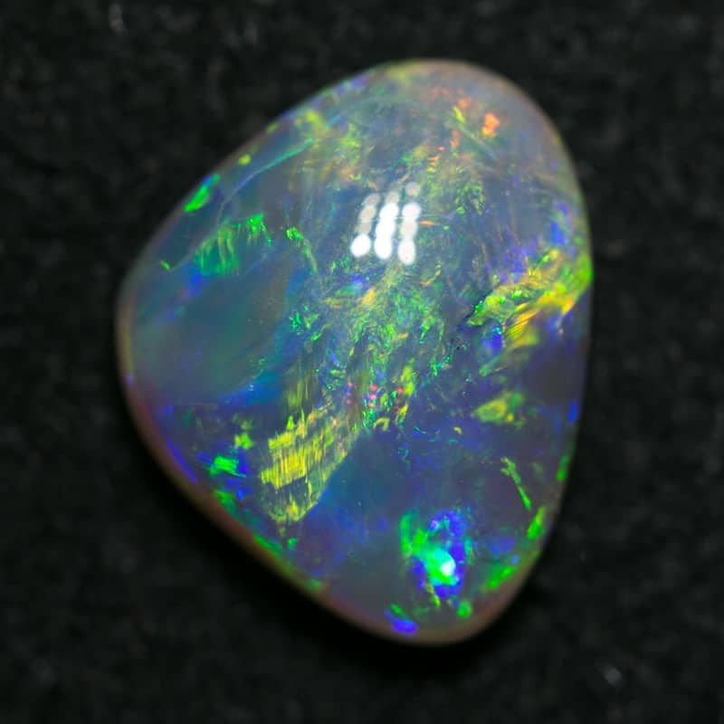 1.41 ct Baroque dark crystal opal 9x7x3mm - Image 4