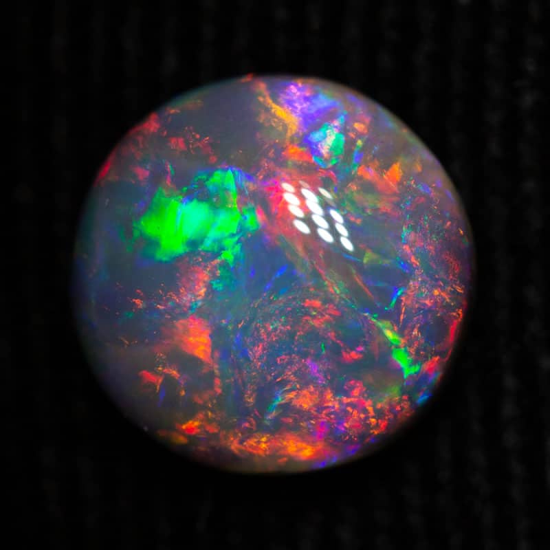 1.42 ct black opal gem 8mm round x 2.3mm - Image 2