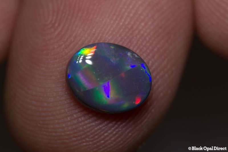 1.44 ct ribbon pattern black opal 9x7x3mm - Image 3
