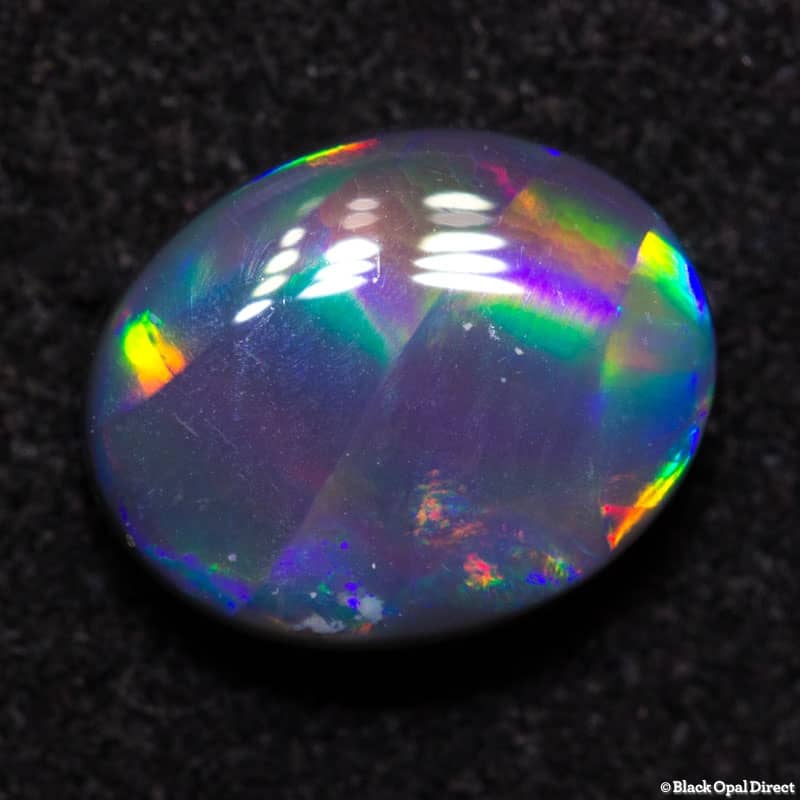 1.44 ct ribbon pattern black opal 9x7x3mm - Image 8