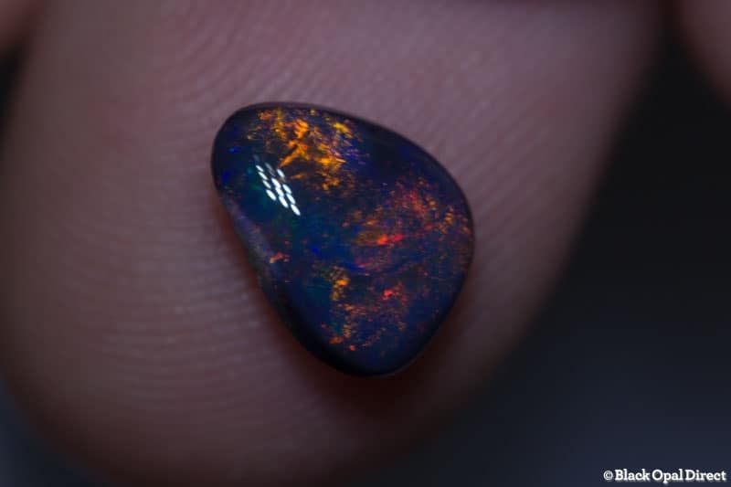 1.45 ct baroque black opal 9x7x3mm - Image 2