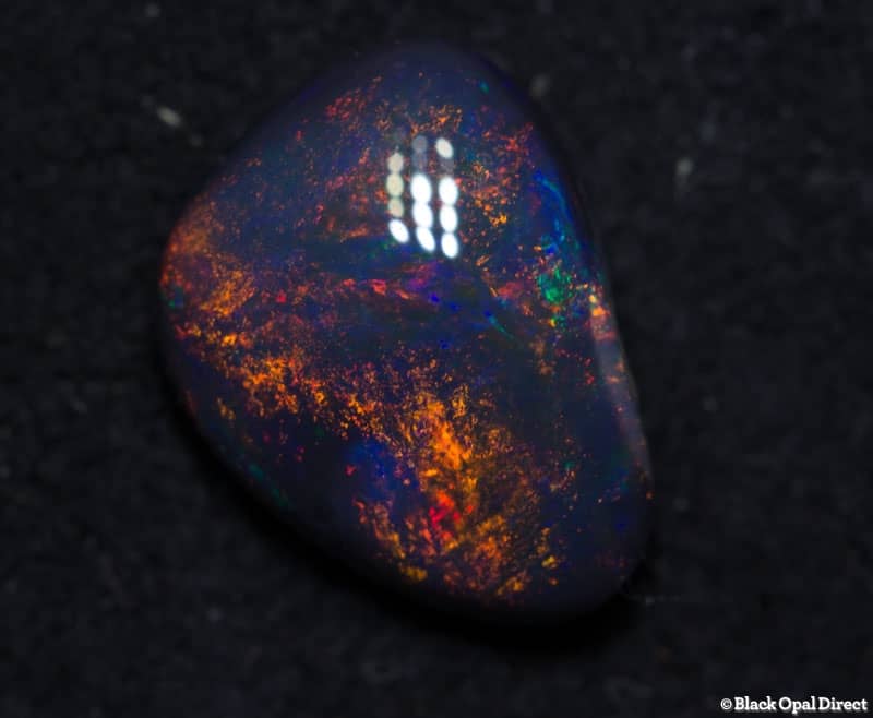 1.45 ct baroque black opal 9x7x3mm - Image 3