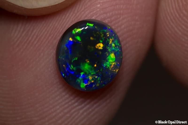 1.45 ct black opal 8x7.5x3mm - Image 2