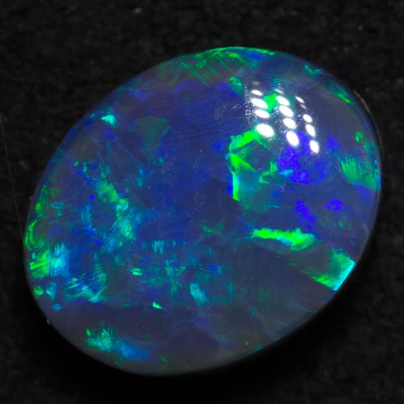 1.46 ct black opal 8x6.5x4mm - Image 2