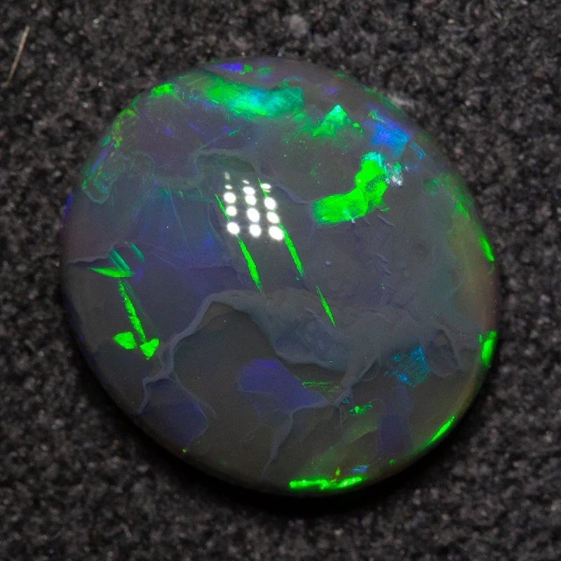 1.46 ct black opal 8x8.9x3.3mm - Image 2
