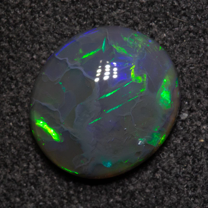 1.46 ct black opal 8x8.9x3.3mm - Image 3