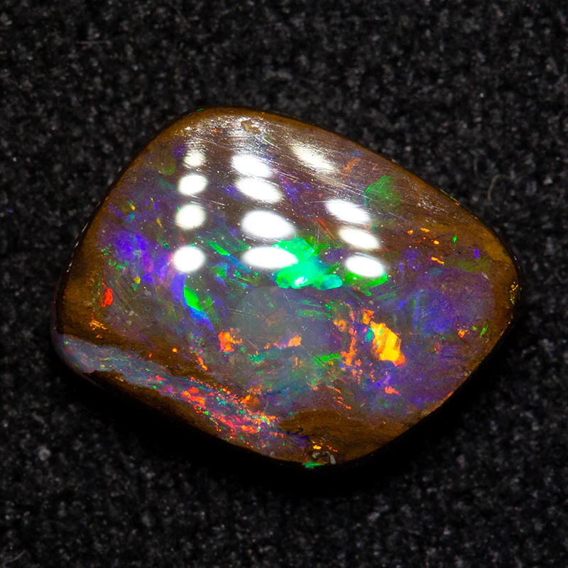 1.46 ct boulder opal 8.2x6.4x2.8mm - Image 2