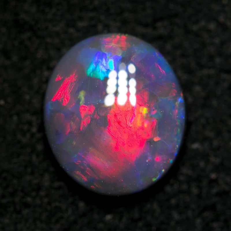 1.48 ct pink on black opal 8.8x7.7x3mm - Image 5