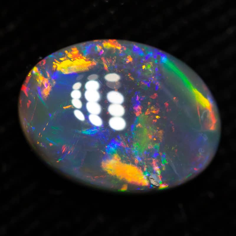 1.50 ct black opal 9x7x3.8mm - Image 2
