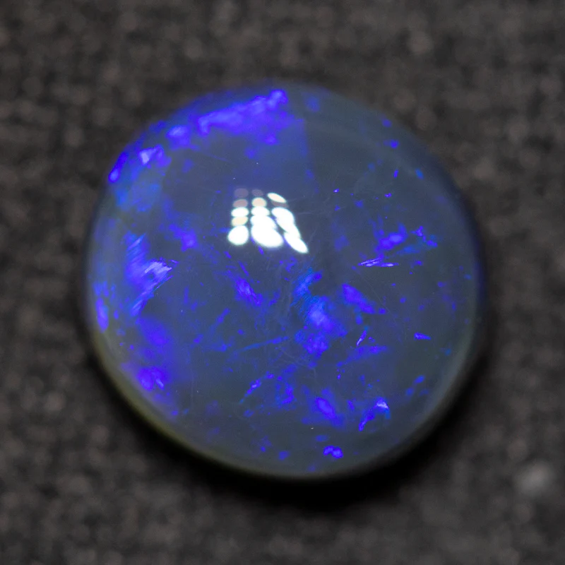 1.53 ct black opal 7.7x7.3x4.4mm - Image 2